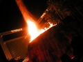 Volcano shooting skyward, fire, water and light show