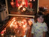Alyssa posing next to the pinball game (restoration in progress) called Eight Ball Deluxe Alyssa posing next to the pinball game (restoration in progress) called Eight Ball Deluxe
