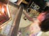Alyssa playing the pinball game. Alyssa playing the pinball game.
