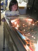 Alyssa playing the pinball game from the back. Alyssa playing the pinball game from the back.
