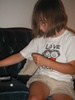 Alyssa making a necklace. Alyssa making a necklace.