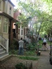 Side view of film equipment outside of house.